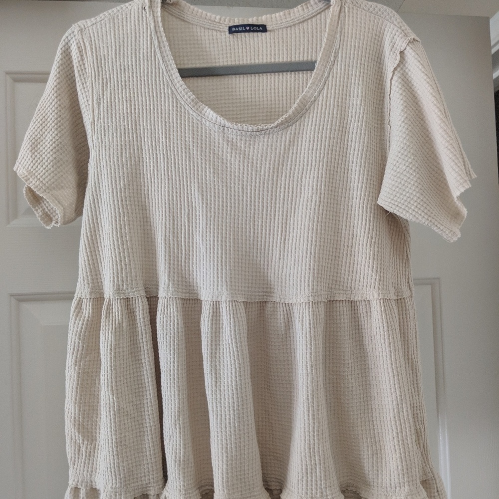 Waffle knit ruffle bottom top